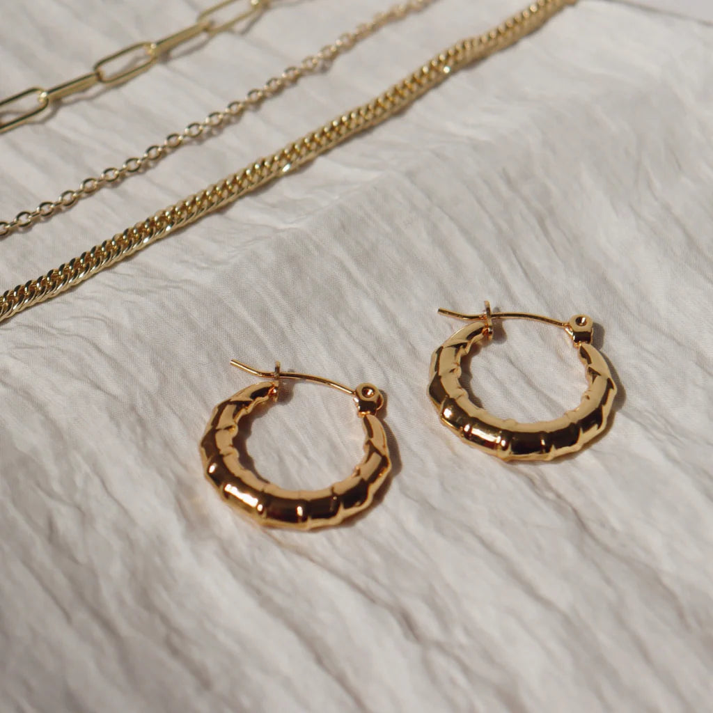 STEEL ME YELLOW GOLD TWIST HOOPS