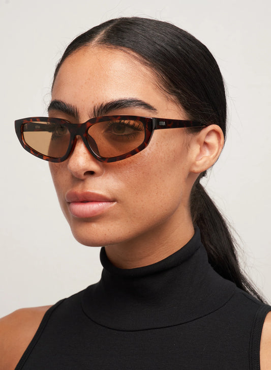 Nikki Tort/ Brown
