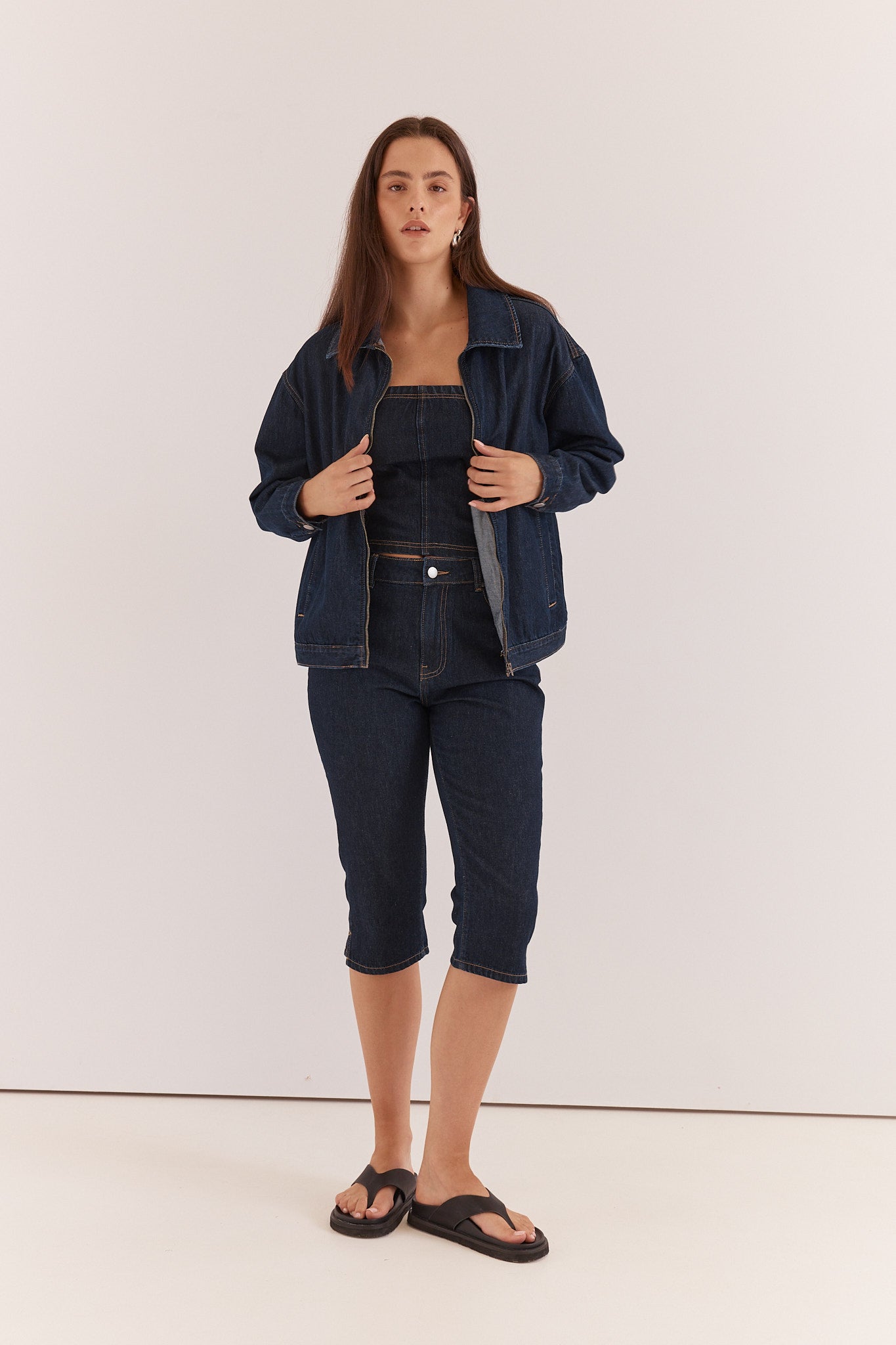 Sass & Kumi deep indigo denim jacket styled with matching knee-length denim shorts and black sandals